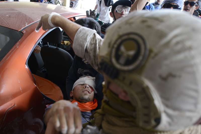 智利陷入嚴重抗爭與動亂將近一個月，至少逾200名示威者被警方攻擊而失明。（AP）