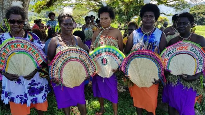 Women in tribal colours attend a Bougainville reconciliation ceremony