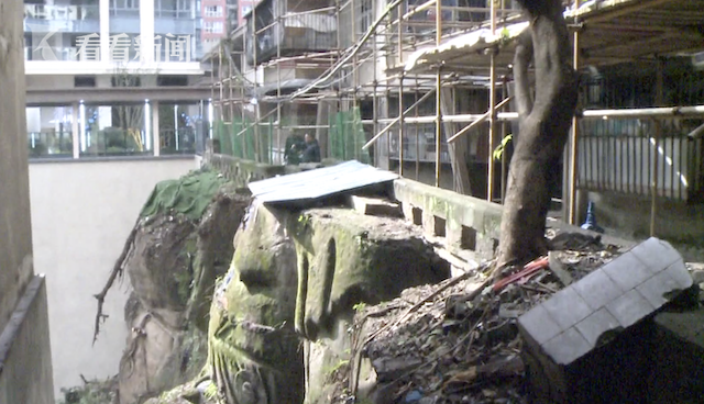 小区惊现9米高无头巨佛石像 住户：存在60多年了